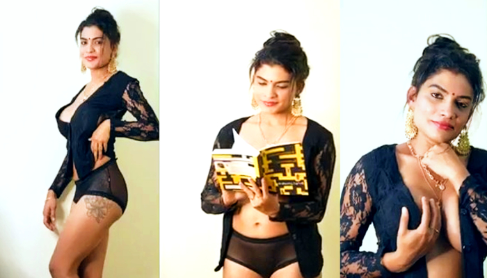 Resmi R Nair Reading Book in Black Dress